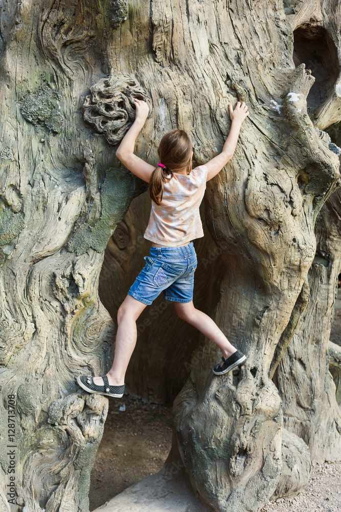 Girl child outdoors climb tree Girl child outdoors climb tree