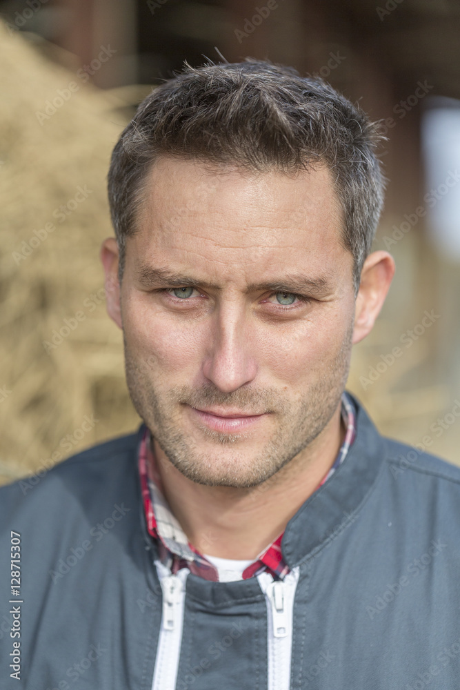 Fototapeta premium Portrait of young attractive farmer