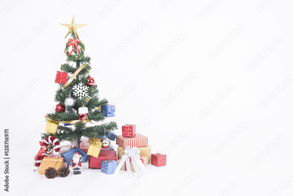 Christmas decorative with gift box and snowflake on christmas tree and white background.