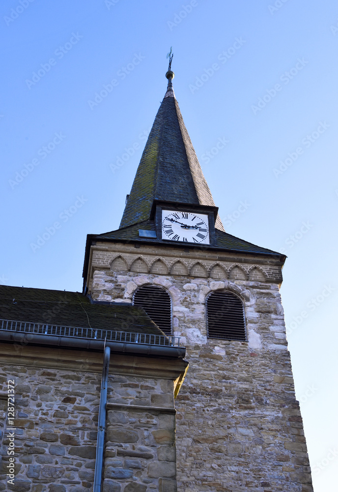 Church tower with blue sky.