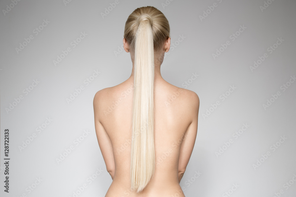 Obraz premium Portrait Of A Beautiful Young Blond Woman Ponytail Hairstуle