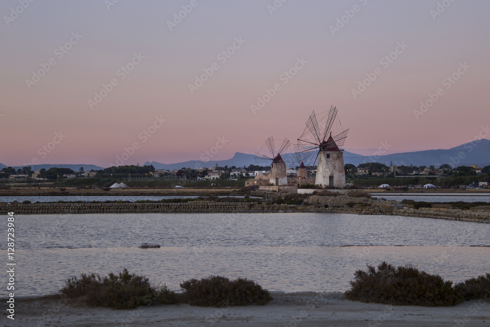 salt flats windmills at sunset lights