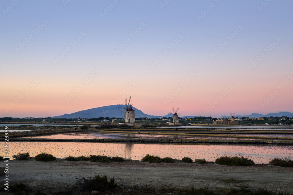 salt flats windmills at sunset lights