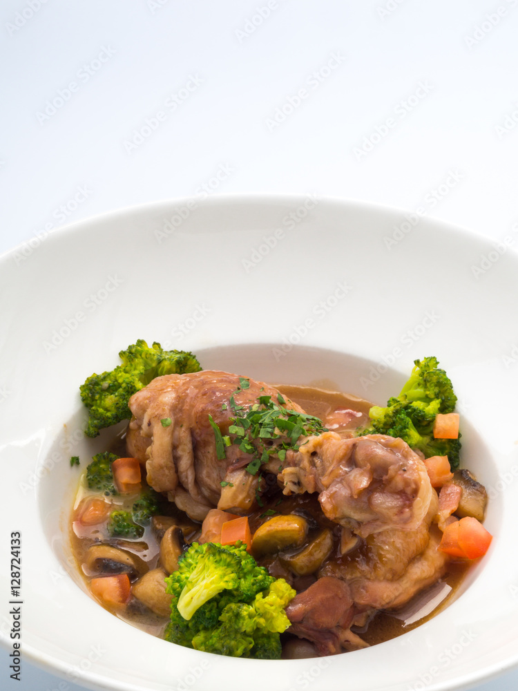 Rooster cooked in red wine. Rooster cooked in red wine.