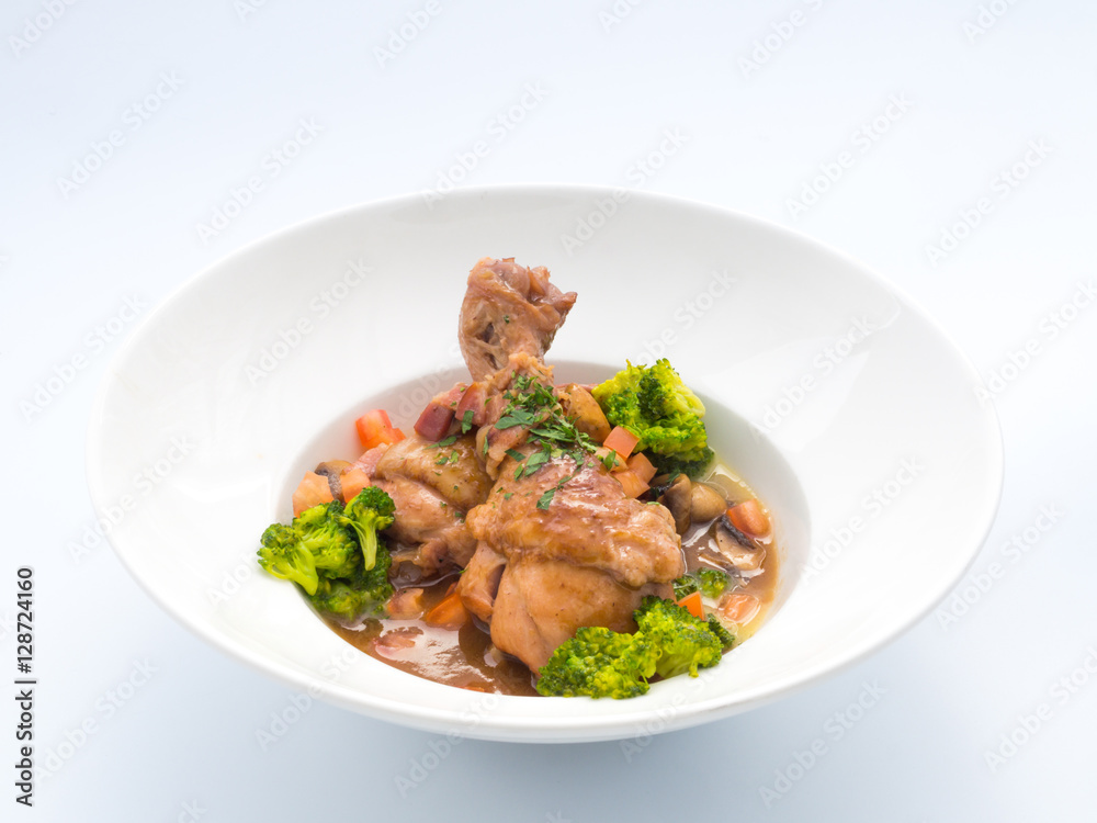 Rooster cooked in red wine. Rooster cooked in red wine.