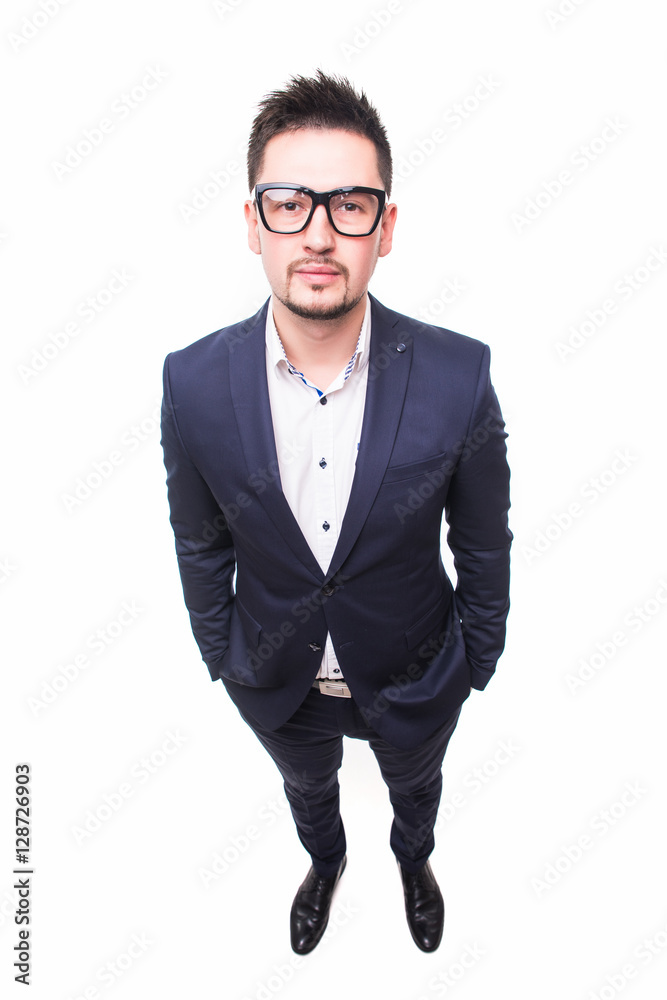 Portrait of curious bearded young businessman in glasses Portrait of curious bearded young businessman in glasses