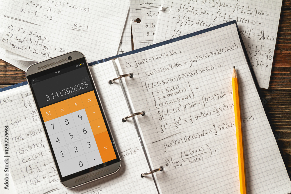 Mathematical equations written in a notebook. Calculator app. - obrazy, fototapety, plakaty 