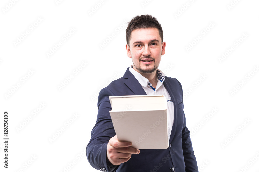 Portrait of a smiling bearded guy in suit giving book to camera over white background Portrait of a smiling bearded guy in suit giving book to camera over white background