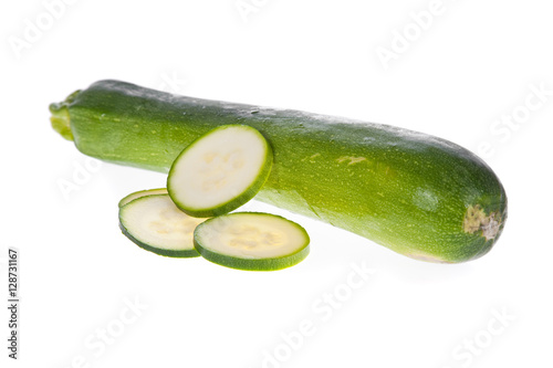 Sliced zucchini or courgette isolated on a white background..