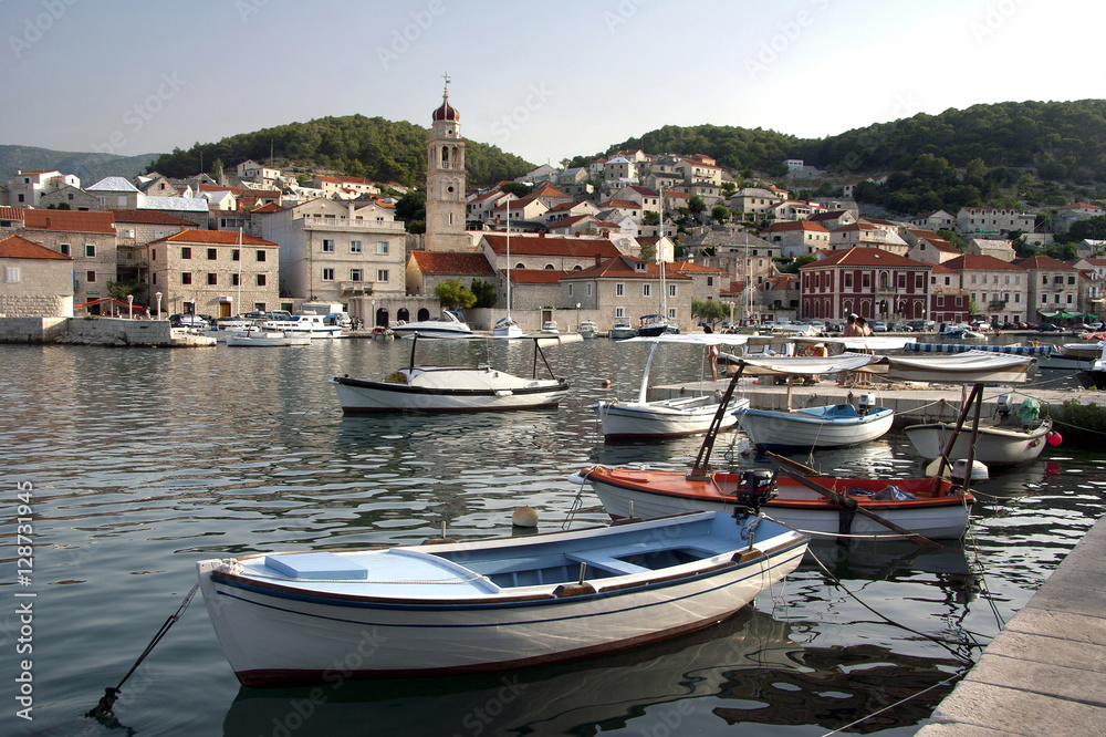 Pucisca harbour with St. Jerome church on island Brac in Croatia