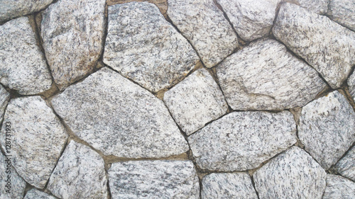 Stone wall texture on the beach