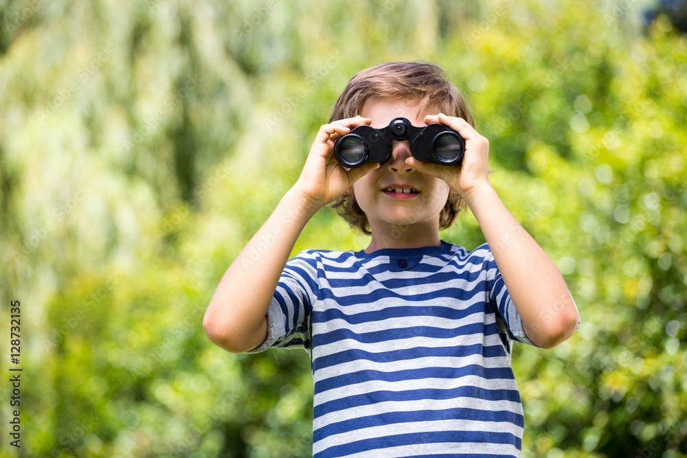 Portrait of cute boy using binoculars Portrait of cute boy using binoculars