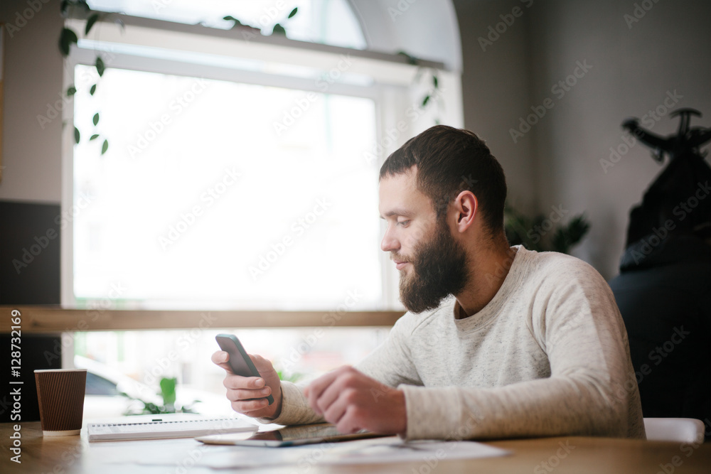 Fototapeta premium Man using tablet pc at the office