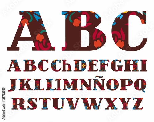 Spanish alphabet, decorative flowers, vector font, capital letters, brown. The letters of the Spanish alphabet with serifs. Red and blue flowers on a brown background. 