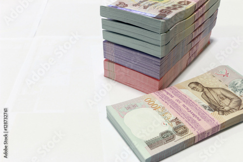 Slika na platnu Thai currency on White background ,Stack of thai baht