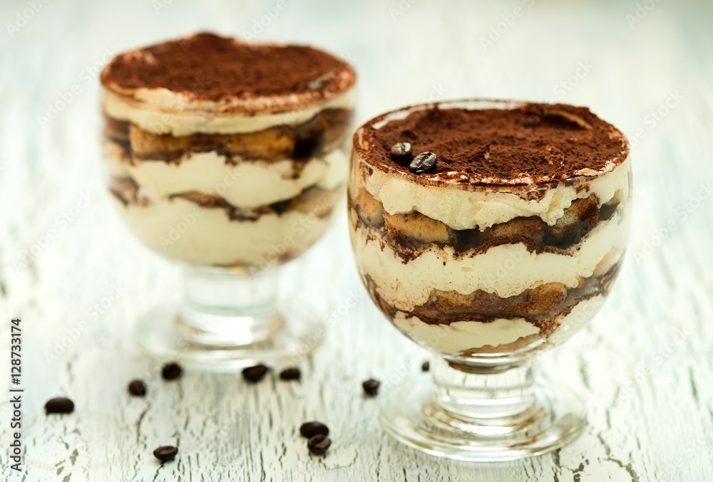 Italian dessert tiramisu in glass, sweet food Italian dessert tiramisu in glass, sweet food