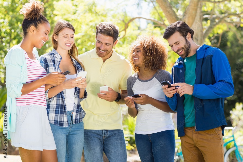 Group of friends using mobile phone Group of friends using mobile phone
