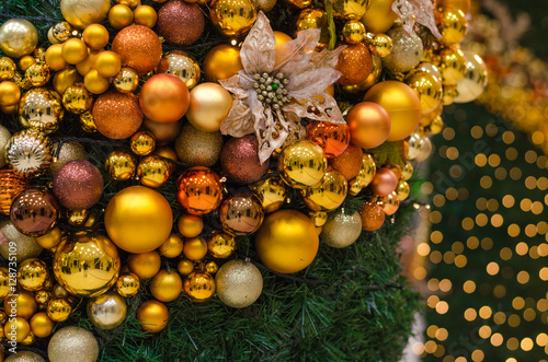 Christmas decorations on blue modern reception desk in hotel on background.