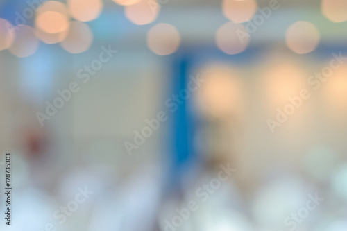 Blurred bokeh light in hall colorful defocus art abstract background