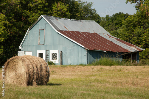 Hay roll and barn
