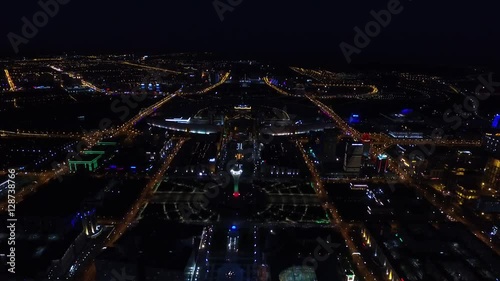 Astana, Kazakhstan. Aerial night view over center of city photo