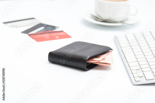 Money bag with keyboard on white background