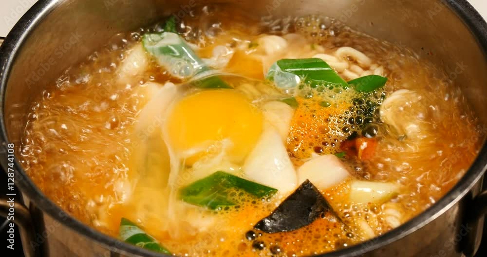 Cooking of korean noodle named ramyeon in boil.