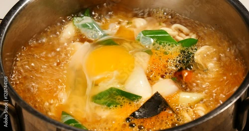 Cooking of korean noodle named ramyeon in boil. photo