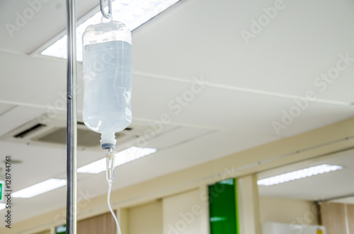 Close up saline IV drip for patient and Infusion pump in hospital