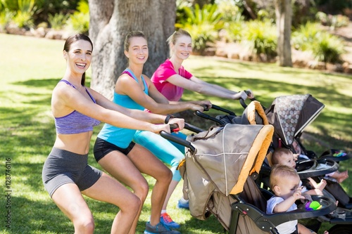 Women exercising with baby stroller 
