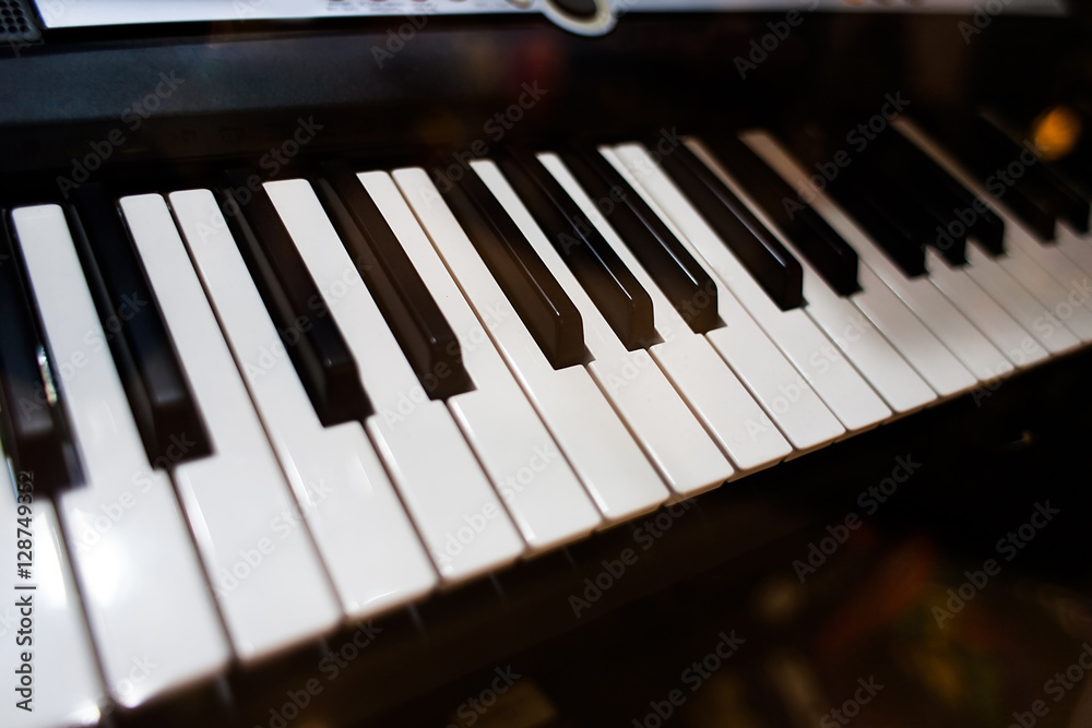 Close up view on piano in store Close up view on piano in store