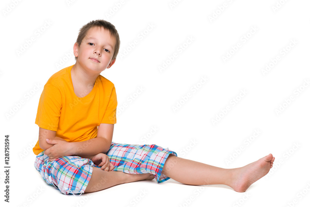 Smiling little boy sits Smiling little boy sits