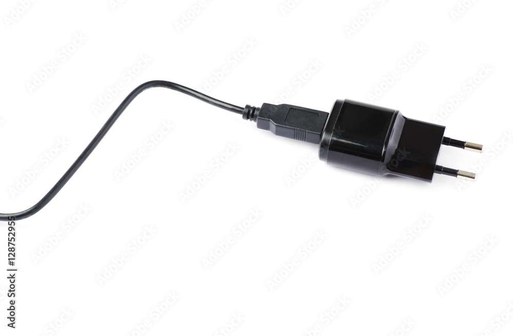 Black usb adapter charger isolated over the white background Black usb adapter charger isolated over the white background