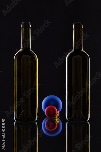 Silhouette of elegant wine bottles and Christmas decoration