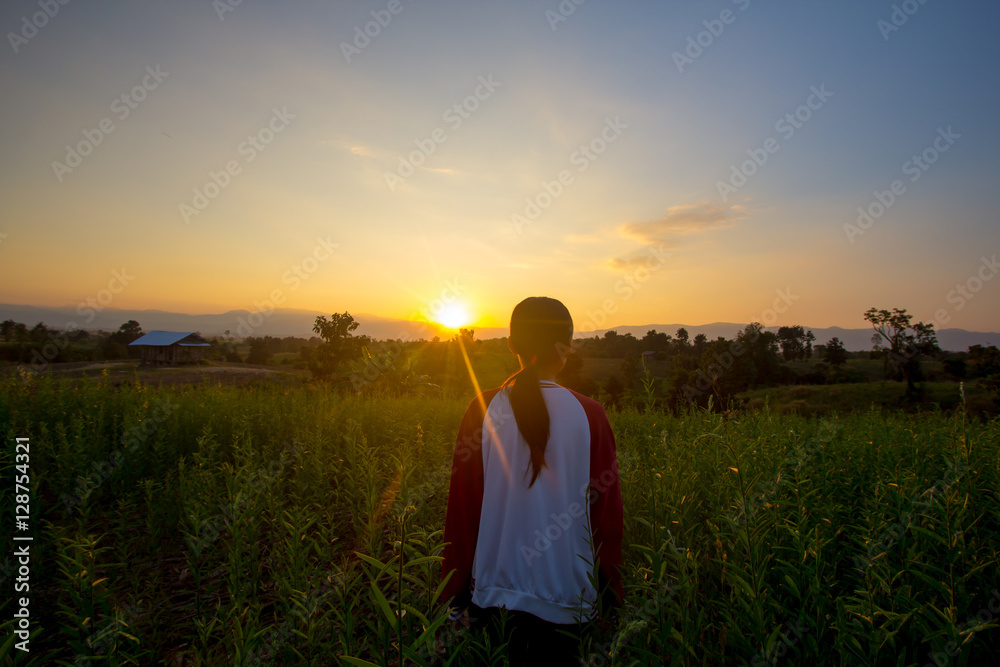 standing on a mountain, enjoying the sunset standing on a mountain, enjoying the sunset