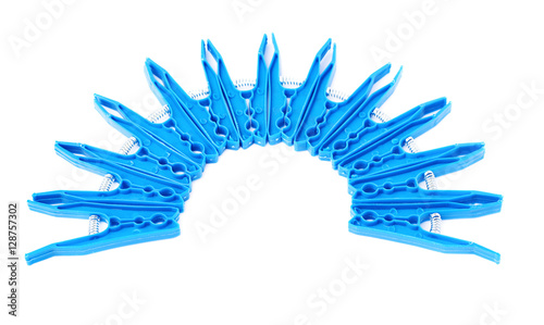 Semicirle shape of plastic cloth pegs isolated over white background