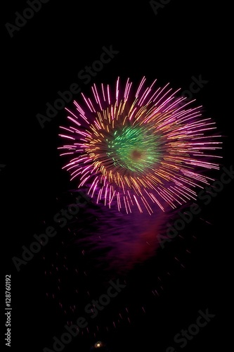 Colorful fireworks isolated in dark background close up with the place for text, Malta fireworks festival, 4 of July, Independence day, New Year, explode. Maltese shell