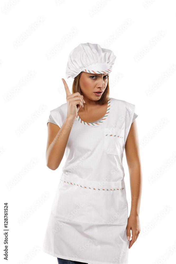 young beautiful woman posing with a chef's apron and cap