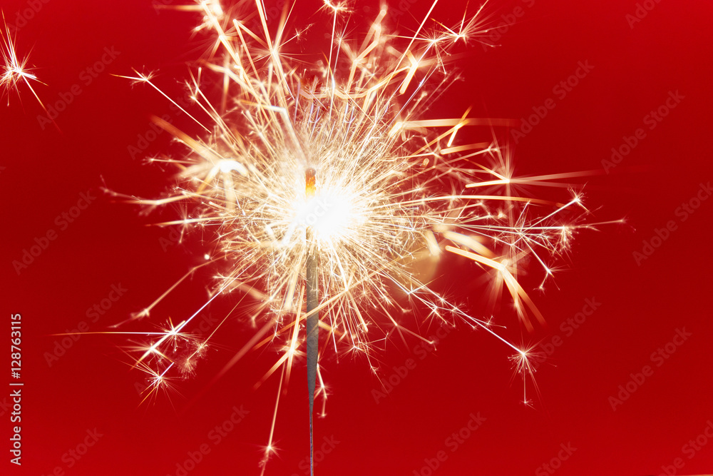 Naklejka premium Christmas sparkle on red background