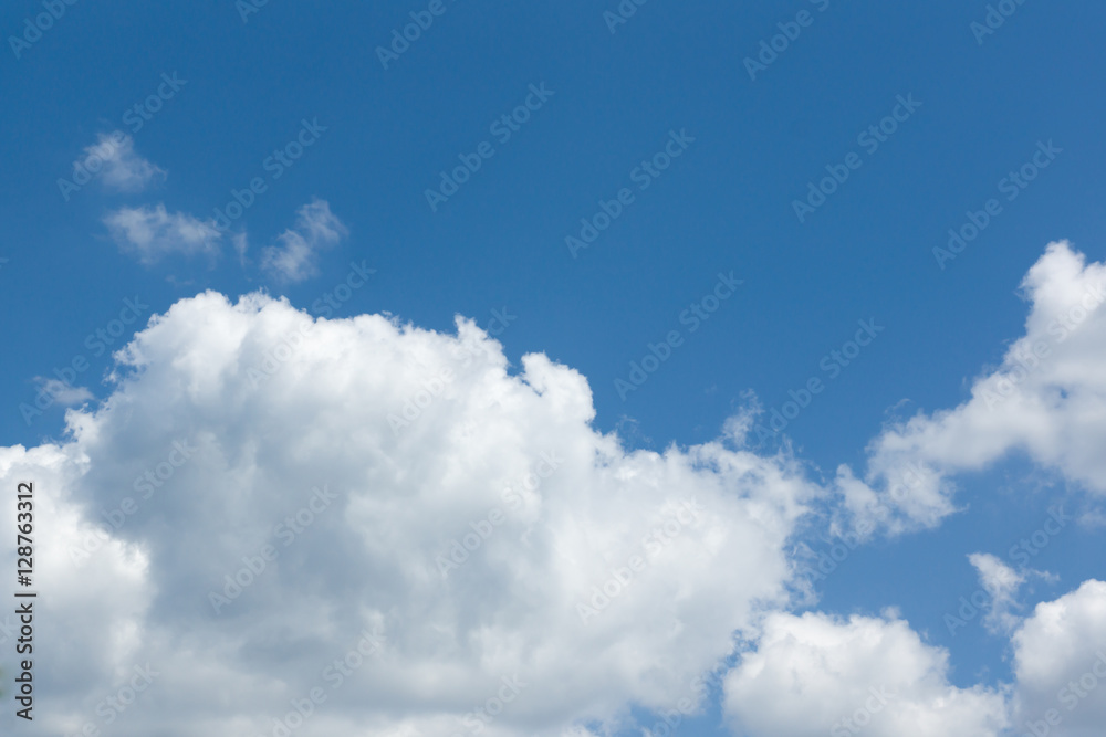 the white clouds floating on a background of blue sky the white clouds floating on a background of blue sky