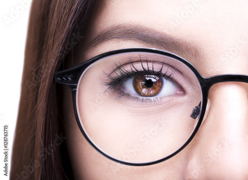 Beautiful young woman wearing glasses. Close-up shot