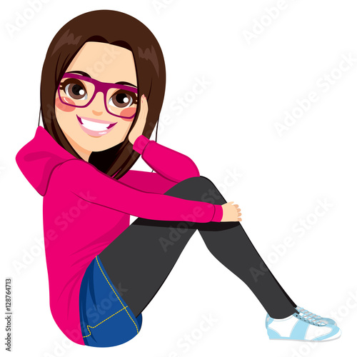Beautiful brunette teenager girl with glasses sitting on isolated white background