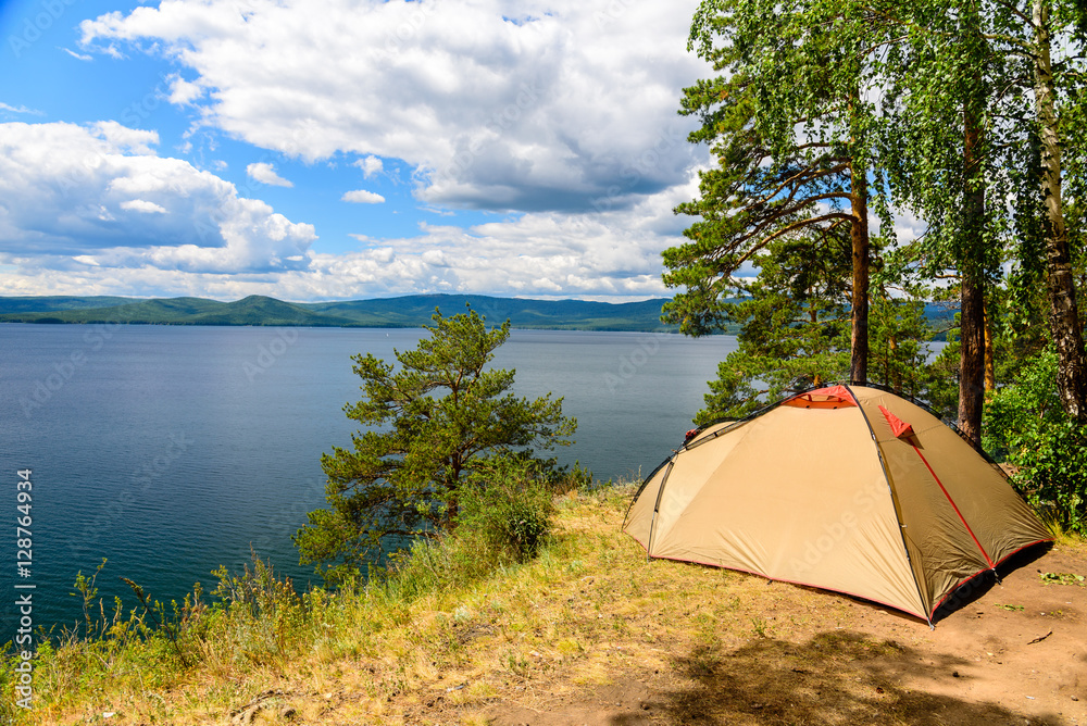 Camping on the cliff by the lake