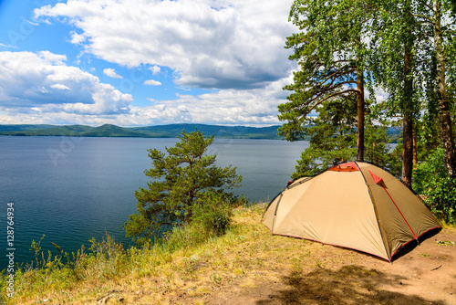 Camping on the cliff by the lake