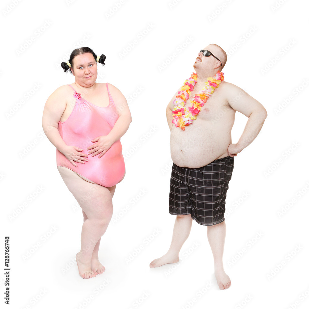 Obese couple in swimsuit with tropical flowers. Funny people ...