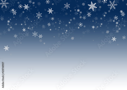 falling snowflakes on blue background