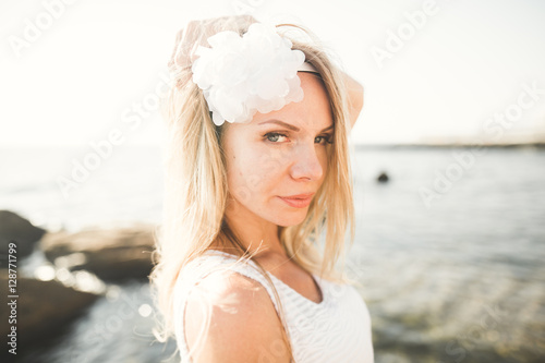 fashion portrait of a girl on the sea © olegparylyak