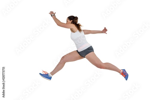 Athlete woman running on white background