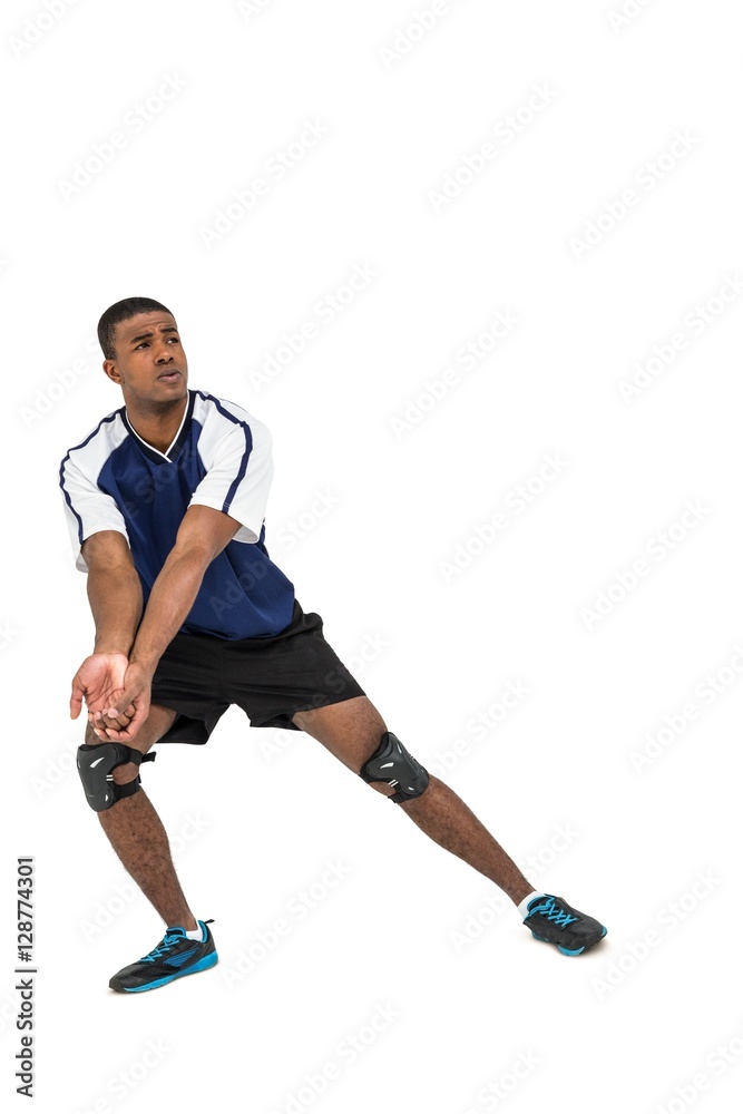 Sportsman posing while playing volleyball