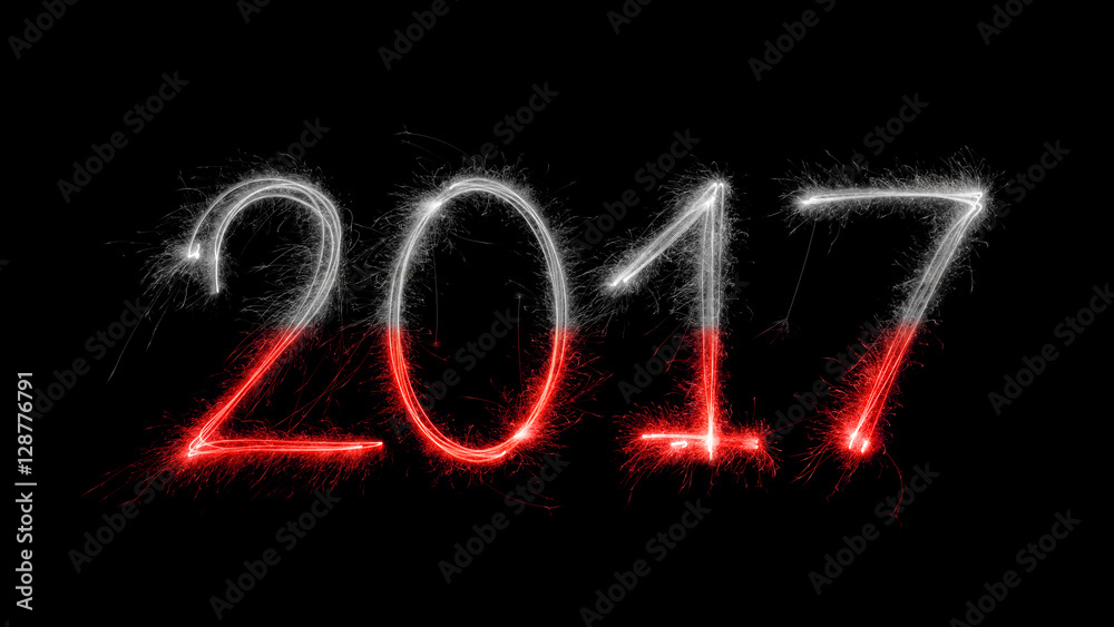 Happy New Year Poland - 2017 with sparklers on black background. Flag of Poland Happy New Year Poland - 2017 with sparklers on black background. Flag of Poland